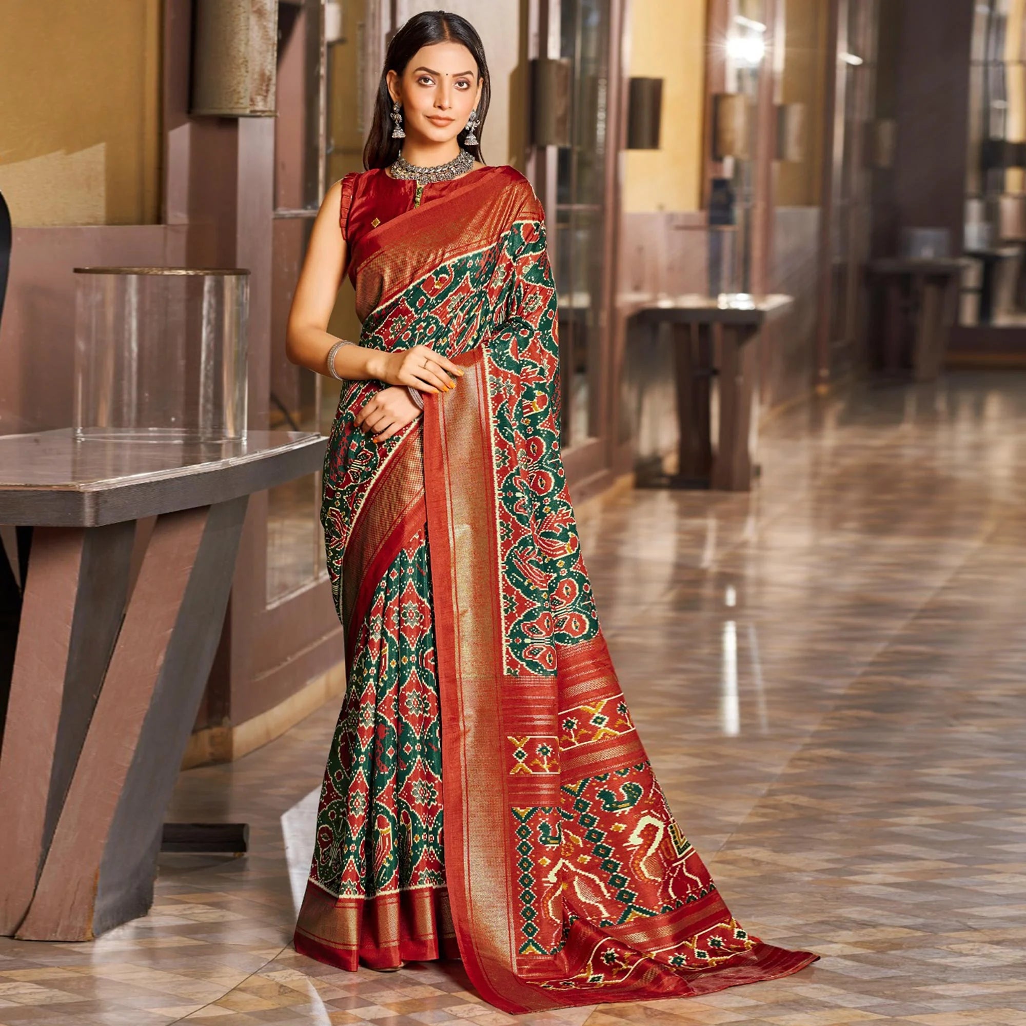 Mirmaya Green & Red Patola Printed Viscose Saree With Zari Border