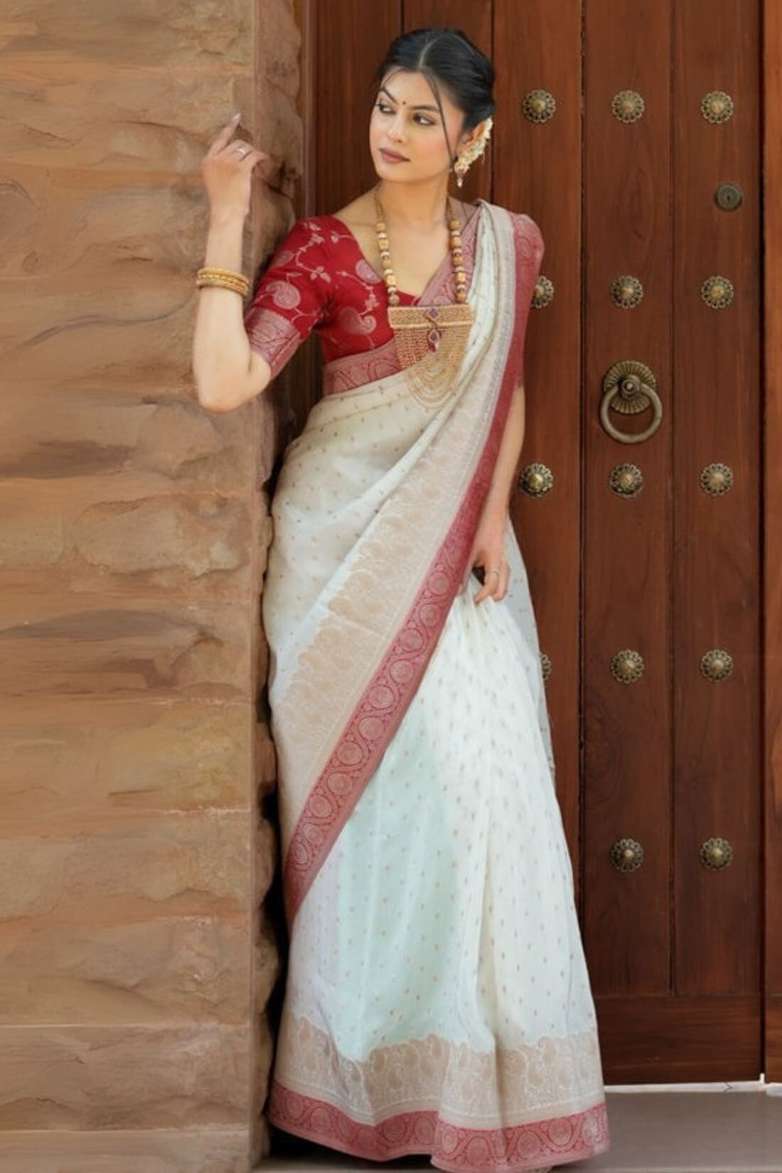 Mirmaya Admirable Off White Soft Silk Saree With Gossamer Blouse Piece