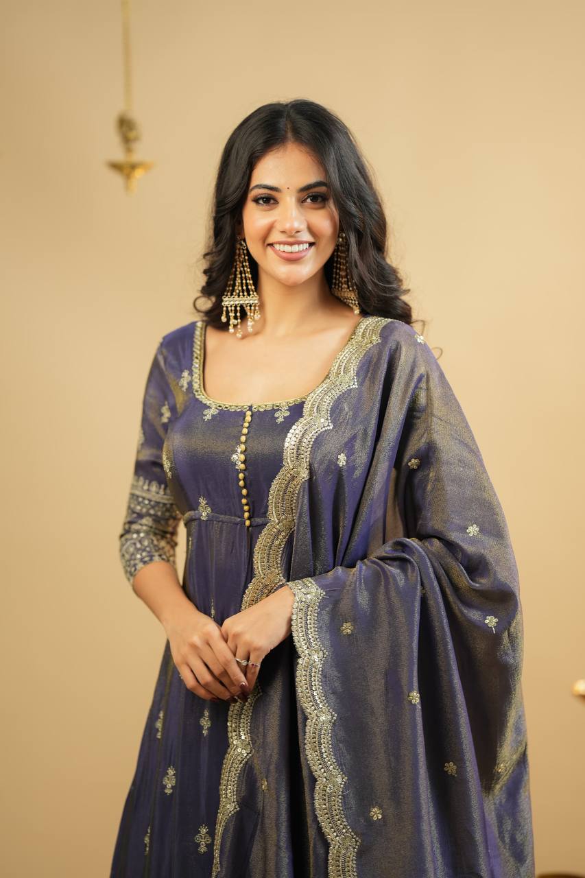 Saakshi`s Grey Cosmo Slik Anarkali Suit With Skirt