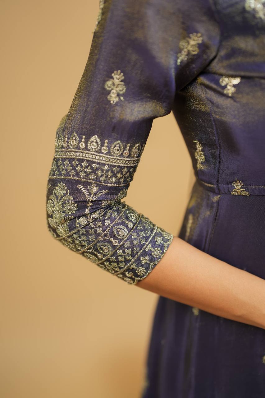 Saakshi`s Grey Cosmo Slik Anarkali Suit With Skirt